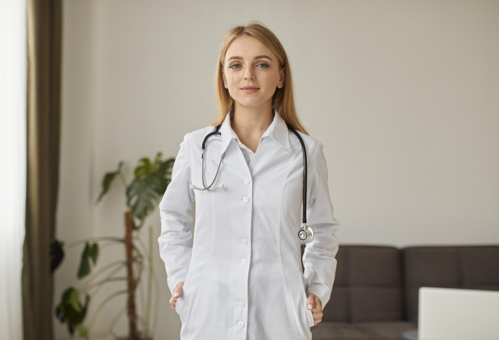 front-view-covid-recovery-center-female-doctor-with-posing-with-stethoscope.jpg